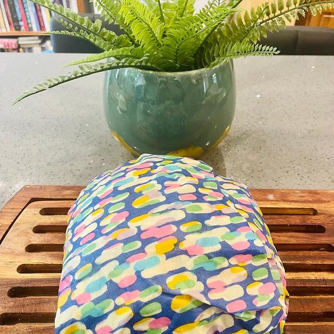 Bright bouquet Bread Saver Beeswax Wrap: Eco-friendly bread saver beeswax wrap featuring a bright bouquet design for sustainable food storage. Plastic-free alternative.